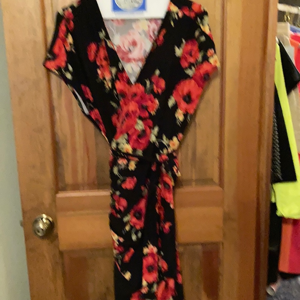 Classic wrap dress in size 14.  Black background with red poppies print